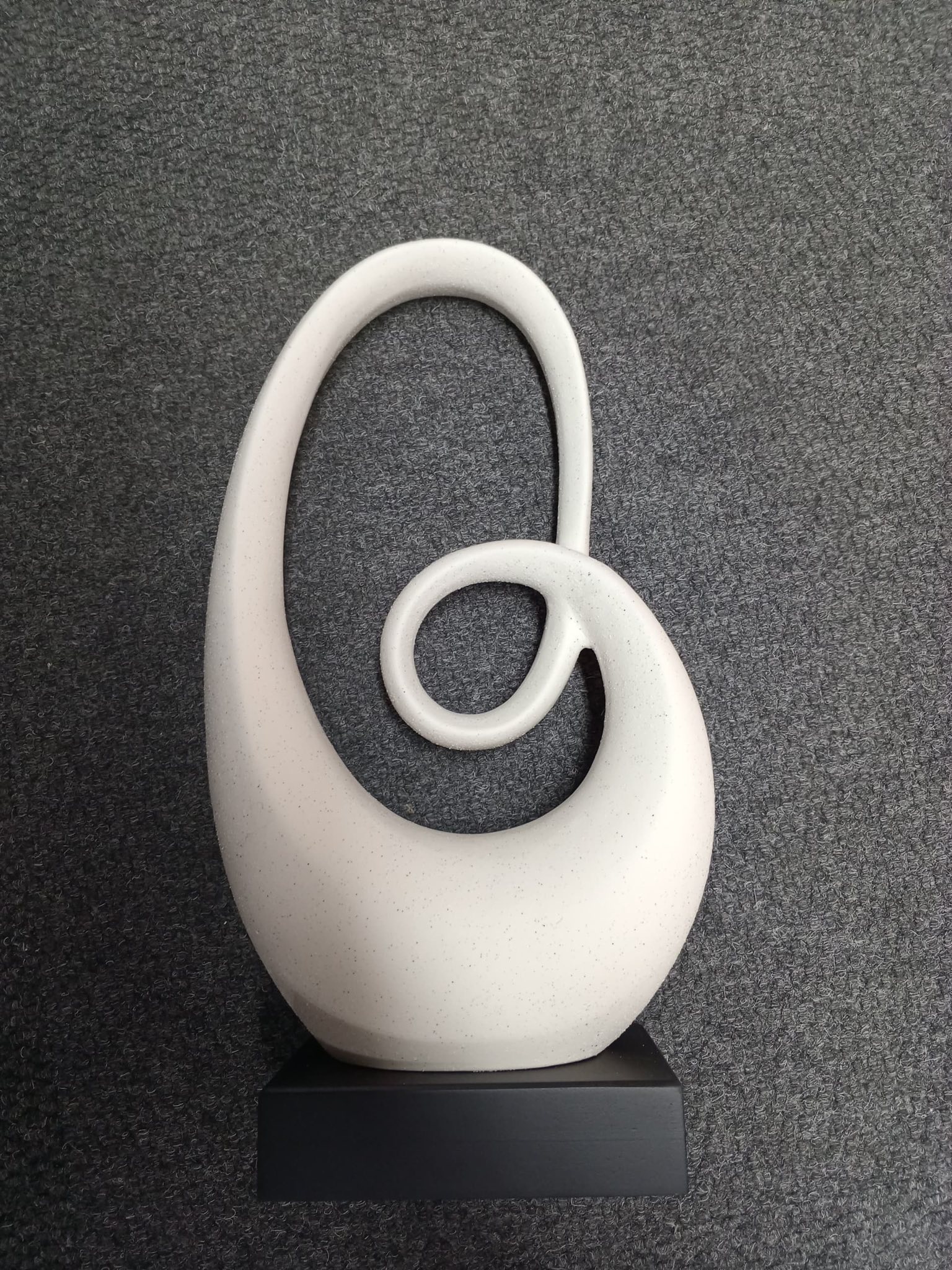 Modern living room setup with sofas and natural wood coffee table at Mmabolao